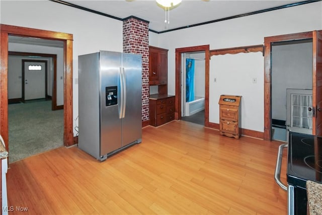 1515 E 3rd St, Port Clinton, OH 43452 - kitchen featuring stainless steel fridge, light wood-type flooring, ceiling fan, ornamental molding, and electric stove
