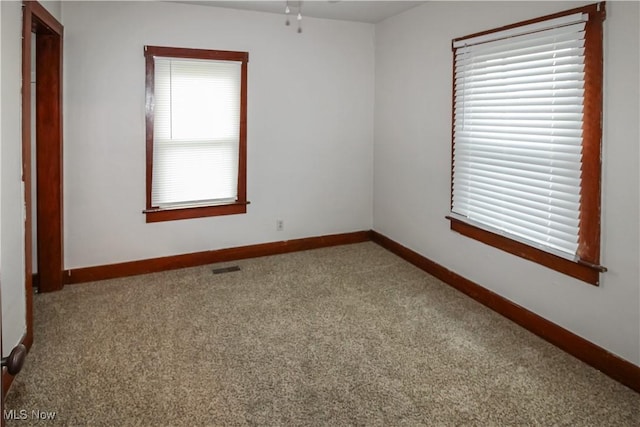 1515 E 3rd St, Port Clinton, OH 43452 - unfurnished room with carpet flooring and baseboards