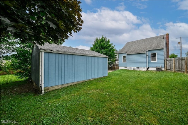 1923 15th St SW, Akron, OH 44314 - view of yard with an outbuilding and central AC