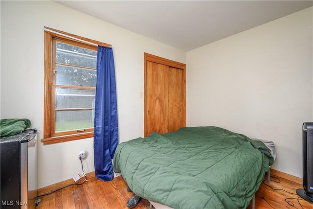 1923 15th St SW, Akron, OH 44314 - bedroom featuring wood finished floors and baseboards