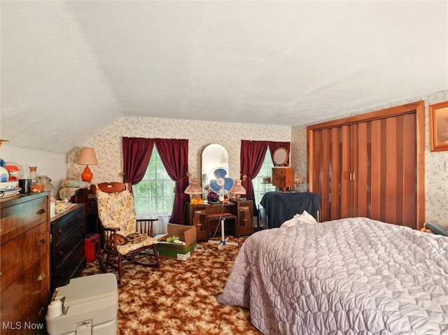 3912 Austinburg Rd, Ashtabula, OH 44004 - carpeted bedroom featuring wallpapered walls and lofted ceiling