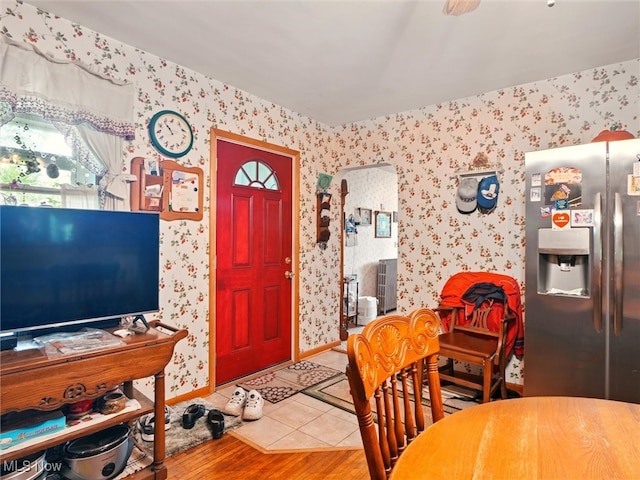 3912 Austinburg Rd, Ashtabula, OH 44004 - entryway with wallpapered walls, tile patterned floors, and baseboards