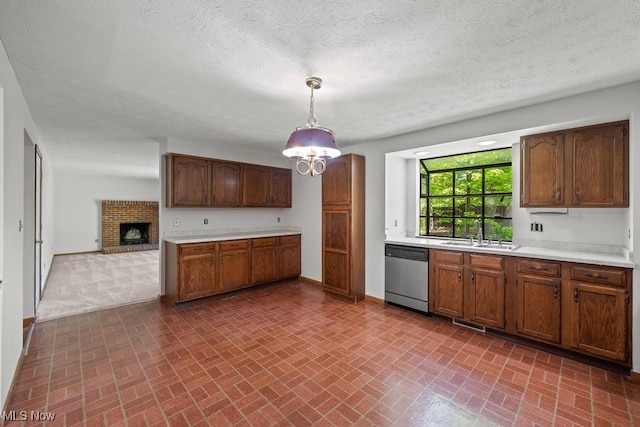 7124 Hollyhock Ln, Solon, OH 44139 - kitchen with stainless steel dishwasher, brick patterned floors, a sink, light countertops, and baseboards