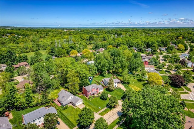 7124 Hollyhock Ln, Solon, OH 44139 - aerial view of residential area with a forest