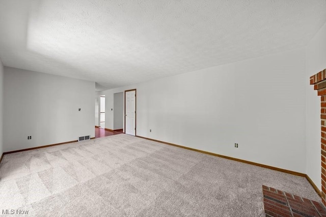 7124 Hollyhock Ln, Solon, OH 44139 - unfurnished room featuring carpet, a textured ceiling, and baseboards