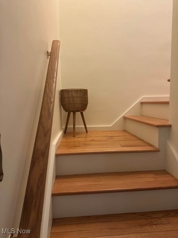 1505 N 14th St, Cambridge, OH 43725 - staircase featuring wood finished floors