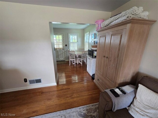 1505 N 14th St, Cambridge, OH 43725 - corridor featuring dark wood-style floors and baseboards