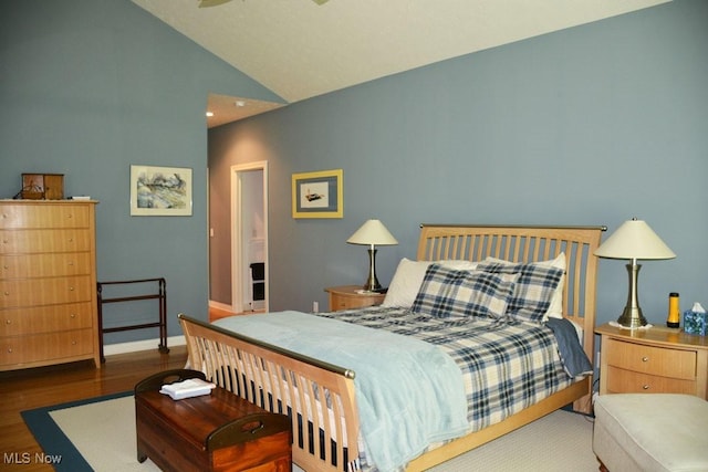 7711 Marewood Pl, Painesville, OH 44077 - bedroom featuring vaulted ceiling, wood finished floors, and baseboards