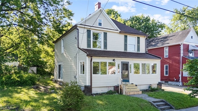 361 Para Ave, Akron, OH 44305 - view of front facade featuring entry steps, a front lawn, and a chimney