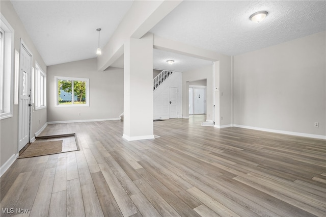 361 Para Ave, Akron, OH 44305 - foyer entrance with wood finished floors, baseboards, stairway, and lofted ceiling