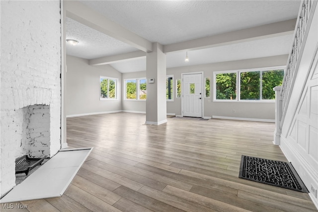 361 Para Ave, Akron, OH 44305 - entryway featuring wood finished floors, a textured ceiling, and baseboards