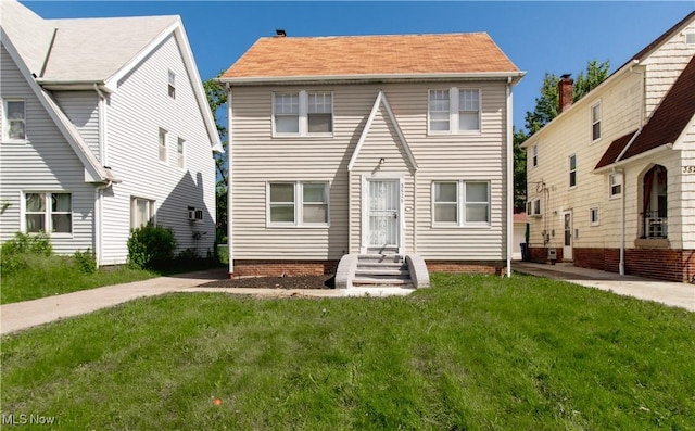 3525 Raymont Rd, University Heights, OH 44118 - view of front of property featuring a front yard and entry steps