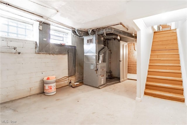 3525 Raymont Rd, University Heights, OH 44118 - below grade area featuring stairway and heating unit