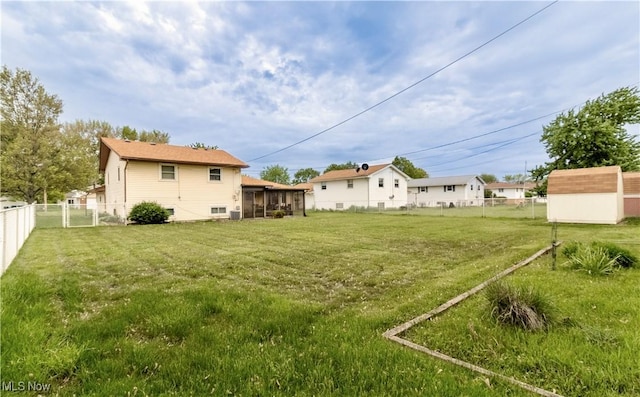 1922 W 38th St, Lorain, OH 44053 - view of yard featuring a sunroom