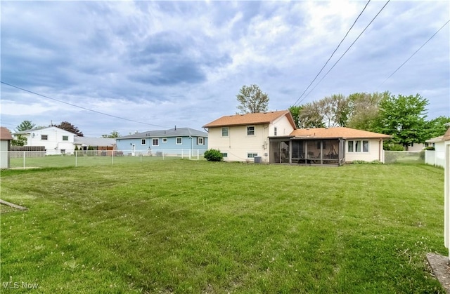 1922 W 38th St, Lorain, OH 44053 - back of property with a sunroom and central AC