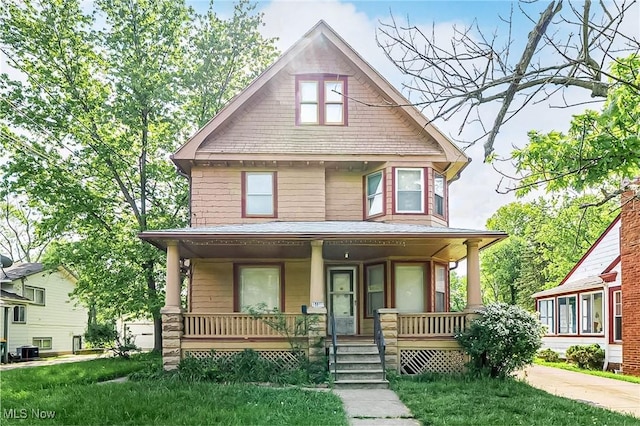5100 Greenhurst Dr, Maple Heights, OH 44137 - view of front of home featuring covered porch and central AC unit