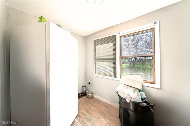 5100 Greenhurst Dr, Maple Heights, OH 44137 - washroom featuring baseboards and light wood-style floors
