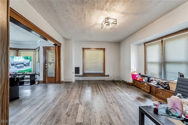 5100 Greenhurst Dr, Maple Heights, OH 44137 - entrance foyer featuring a textured ceiling, wood finished floors, and healthy amount of natural light