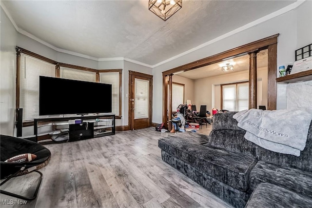 5100 Greenhurst Dr, Maple Heights, OH 44137 - living room featuring wood finished floors, baseboards, and ornamental molding