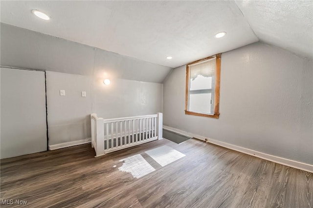 5100 Greenhurst Dr, Maple Heights, OH 44137 - bonus room with vaulted ceiling, wood finished floors, baseboards, and recessed lighting