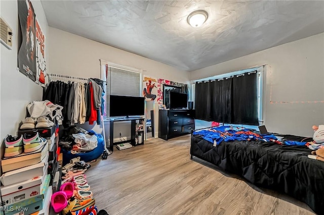 5100 Greenhurst Dr, Maple Heights, OH 44137 - bedroom with light wood finished floors