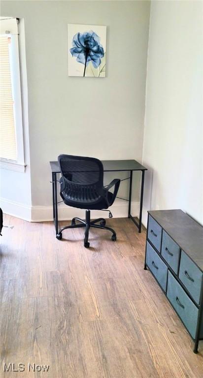 5100 Greenhurst Dr, Maple Heights, OH 44137 - office area with baseboards and light wood-type flooring
