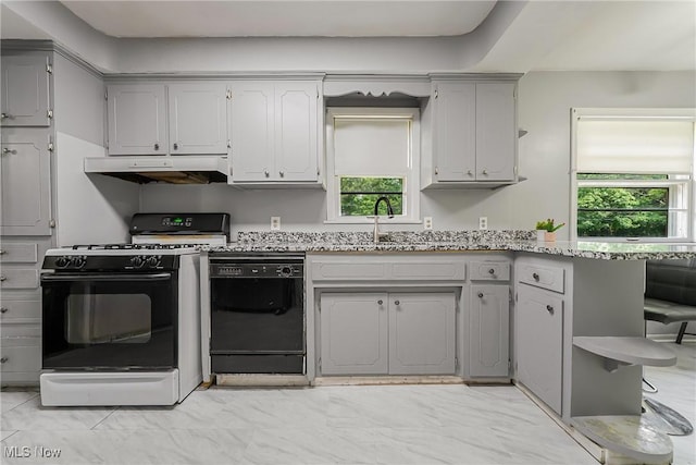 3573 Severn Rd, Cleveland Heights, OH 44118 - kitchen with range with gas stovetop, under cabinet range hood, dishwasher, and gray cabinets