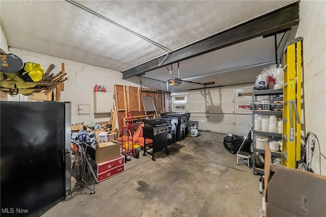 3573 Severn Rd, Cleveland Heights, OH 44118 - garage with freestanding refrigerator and a garage door opener