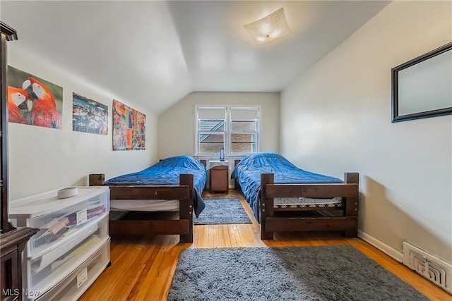 3573 Severn Rd, Cleveland Heights, OH 44118 - bedroom with hardwood / wood-style floors and lofted ceiling