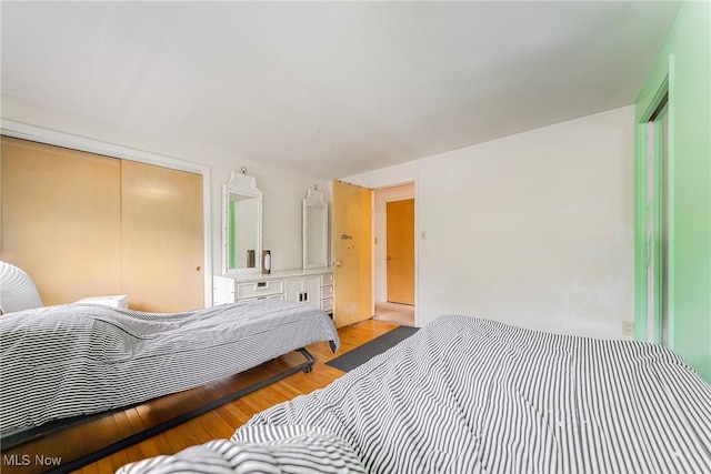 3573 Severn Rd, Cleveland Heights, OH 44118 - bedroom featuring light wood-type flooring and a closet
