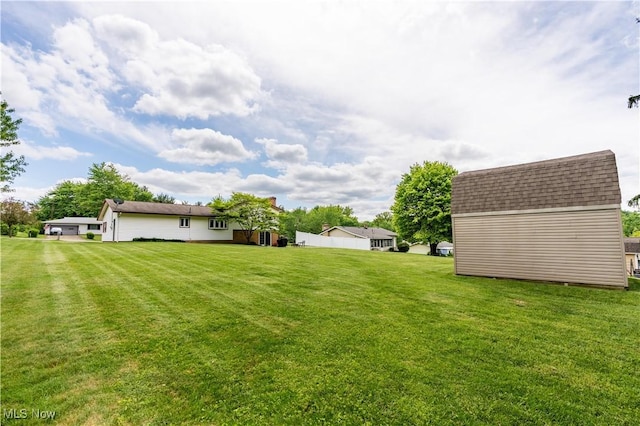 731 39th St SW, Canton, OH 44706 - view of grassy yard with an outbuilding