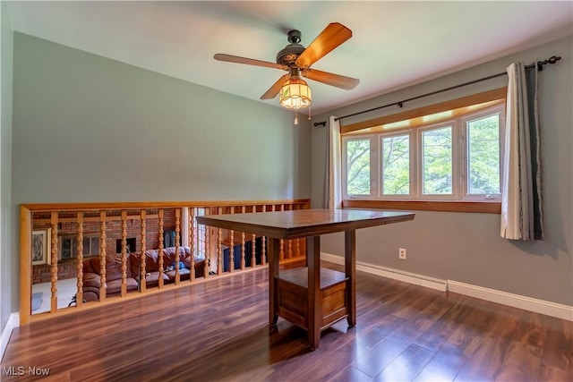 731 39th St SW, Canton, OH 44706 - dining space featuring baseboards, ceiling fan, and wood finished floors