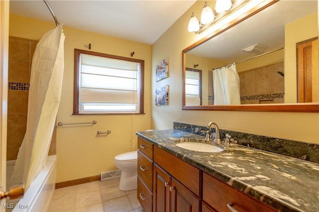 731 39th St SW, Canton, OH 44706 - full bathroom with vanity, tile patterned floors, toilet, shower / tub combo with curtain, and baseboards