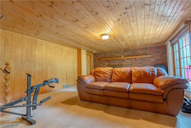731 39th St SW, Canton, OH 44706 - carpeted living area featuring wood ceiling, brick wall, and wooden walls