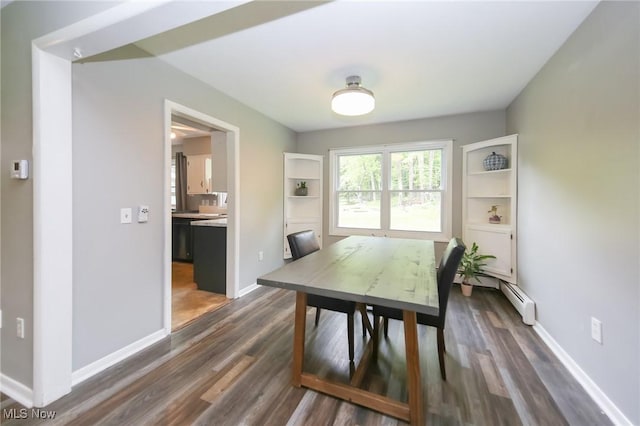 12274 Kile Rd, Chardon, OH 44024 - dining room featuring dark wood-style floors and baseboards