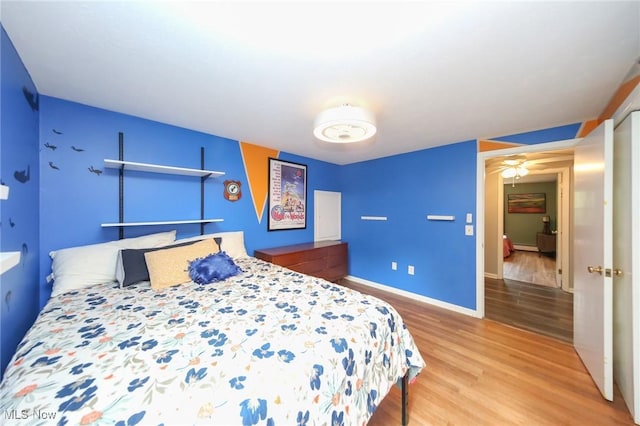 12274 Kile Rd, Chardon, OH 44024 - bedroom featuring wood finished floors and baseboards