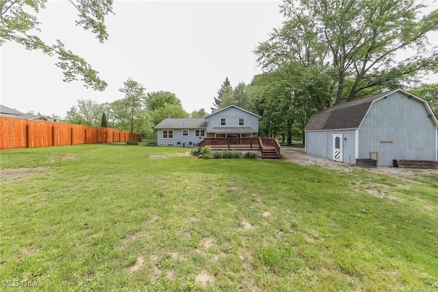 12274 Kile Rd, Chardon, OH 44024 - view of yard featuring a wooden deck and a storage unit