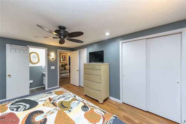 12274 Kile Rd, Chardon, OH 44024 - bedroom with light wood finished floors, recessed lighting, ensuite bathroom, a closet, and a ceiling fan