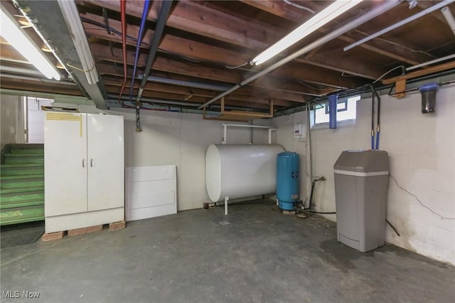 12274 Kile Rd, Chardon, OH 44024 - basement featuring heating fuel, a water softener, and a water pressure tank