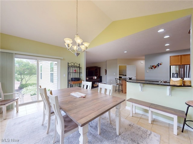 4171 Appleridge Ln, Richfield, OH 44286 - dining area with light tile patterned floors, lofted ceiling, a chandelier, and recessed lighting