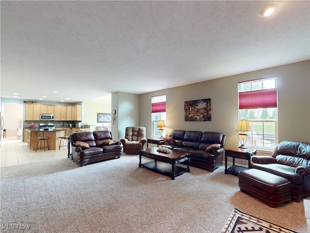 4171 Appleridge Ln, Richfield, OH 44286 - living area with light carpet, recessed lighting, and a textured ceiling