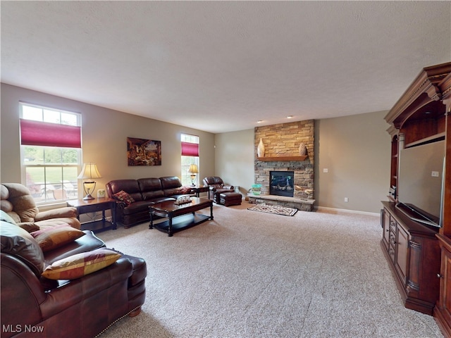 4171 Appleridge Ln, Richfield, OH 44286 - carpeted living area featuring a fireplace and baseboards