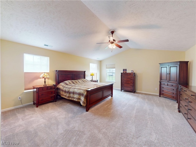 4171 Appleridge Ln, Richfield, OH 44286 - bedroom featuring vaulted ceiling, a textured ceiling, baseboards, light colored carpet, and a ceiling fan