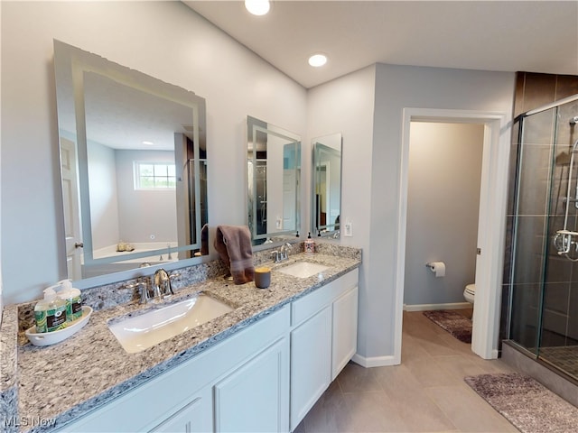 4171 Appleridge Ln, Richfield, OH 44286 - full bath with a shower stall, double vanity, toilet, baseboards, and tile patterned floors