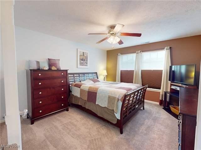 4171 Appleridge Ln, Richfield, OH 44286 - bedroom featuring light colored carpet, ceiling fan, baseboards, and a textured ceiling