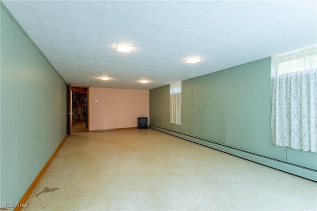 17444 Old State Rd, Middlefield, OH 44062 - spare room featuring tile patterned floors, a baseboard heating unit, and baseboards