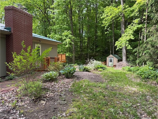 17444 Old State Rd, Middlefield, OH 44062 - view of yard with a deck and a wooded view