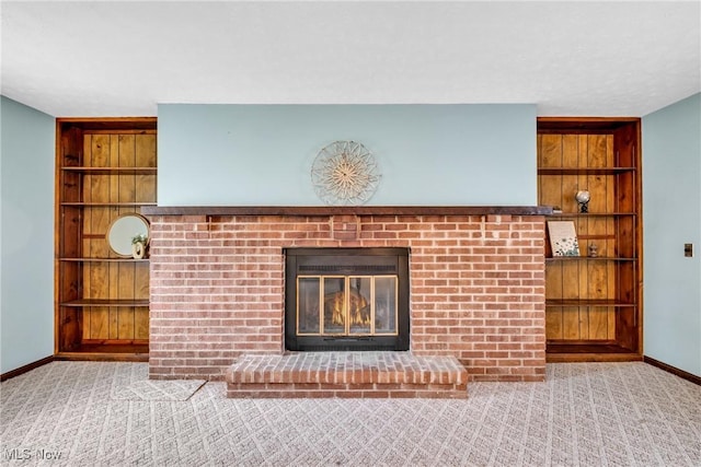 380 Longview Rd, Medina, OH 44256 - detailed view of a fireplace, carpet flooring, built in shelves, and baseboards