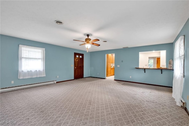 380 Longview Rd, Medina, OH 44256 - spare room with baseboard heating, carpet flooring, plenty of natural light, and ceiling fan