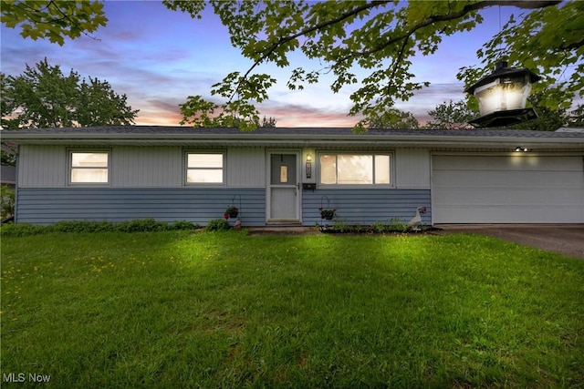 380 Longview Rd, Medina, OH 44256 - view of front of home featuring an attached garage, a yard, and driveway